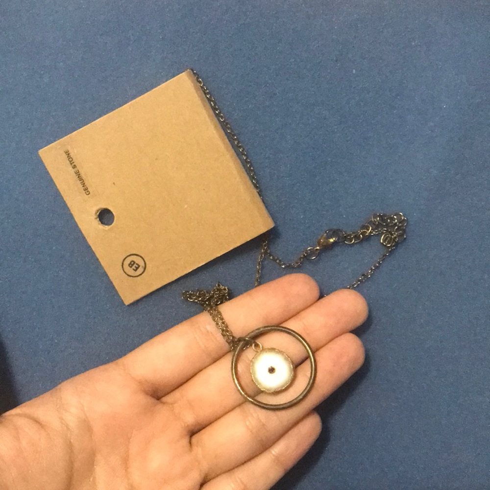 Earthbound necklace with solar quartz pendant